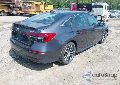 2022 Honda Civic Touring z USA, uszkodzony, nr VIN 2HGFE1F91NH308354